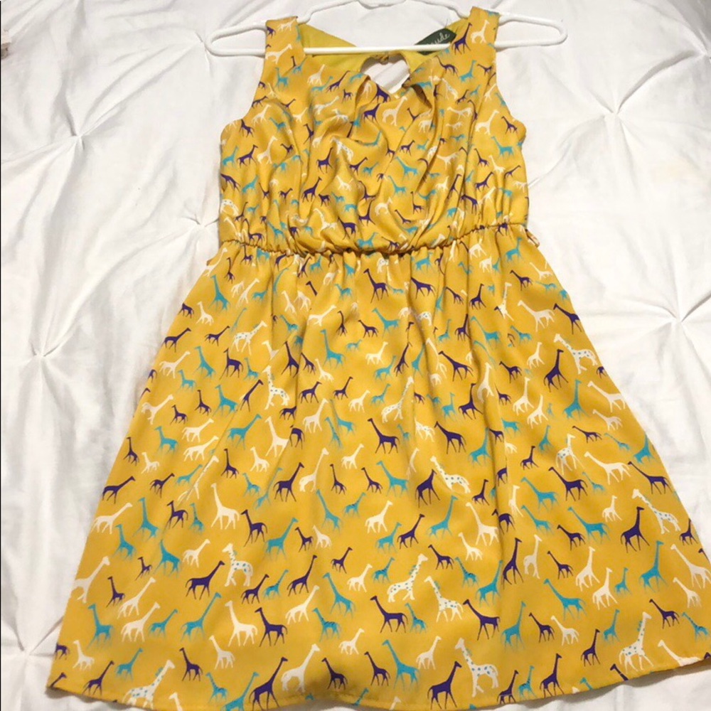 Giraffe multi color print yellow dress. Size S